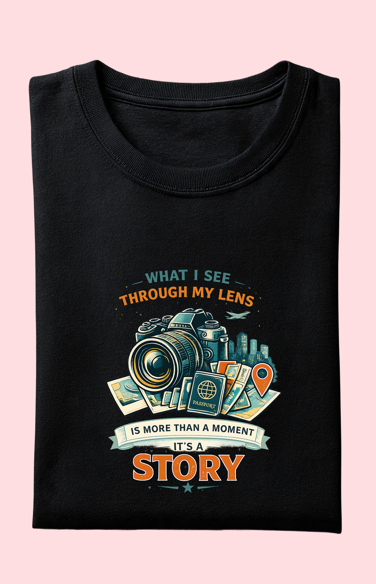 Black graphic tee with camera, passport, and 'What I See Through My Lens Is More Than a Moment, It's a Story' print for photographers.